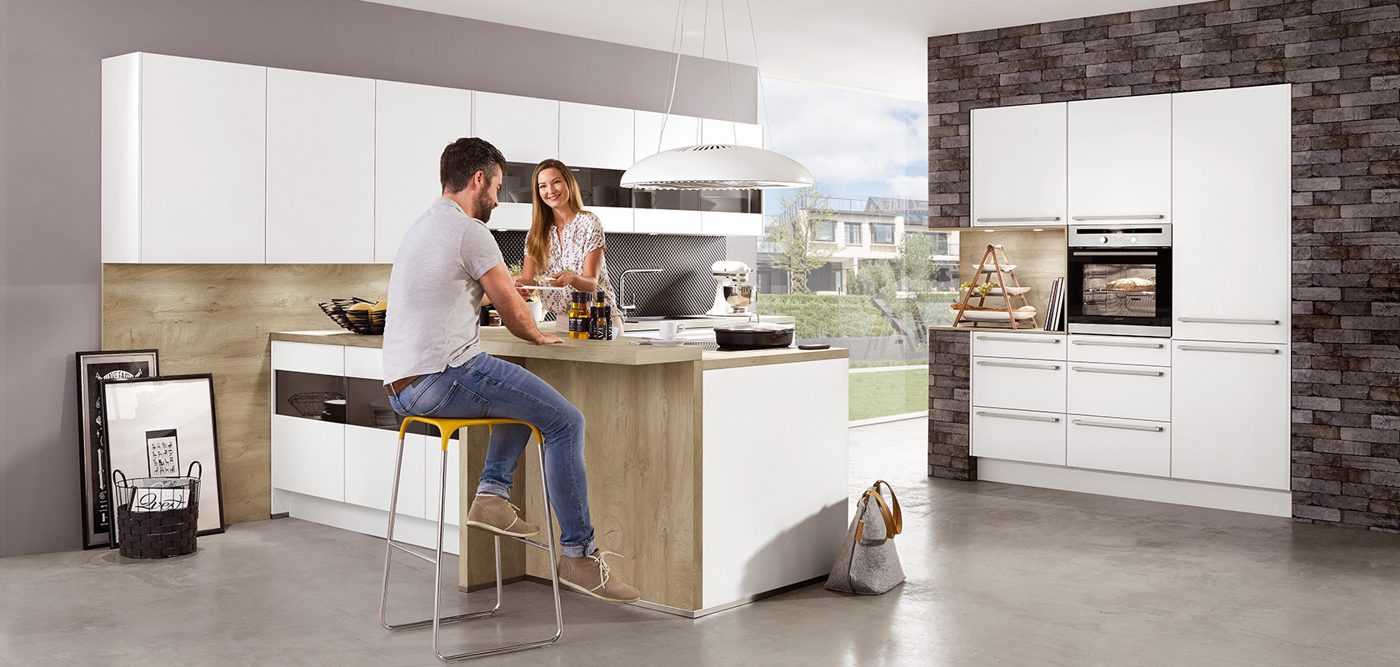Alpine white matt kitchen with oak breakfast bar island